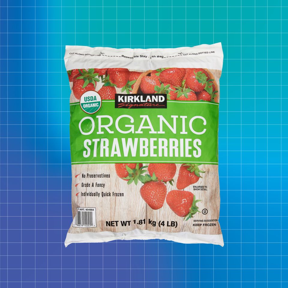 A bag of Kirkland Organic Strawberries against a blue grid background Credit: Costco. Getty Images. EatingWell design.