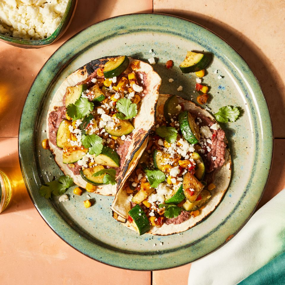 a recipe photo of the Vegetarian Tacos with Zucchini and Corn Credit: Photographer: Jen Causey, Food Stylist: Emily Nabors Hall