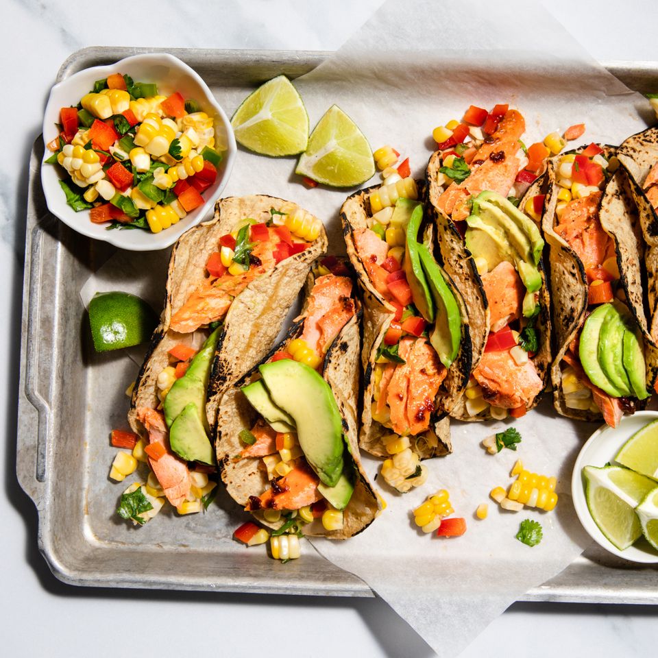 a recipe photo of the Roasted Salmon Tacos with Corn Pepper Salsa Credit: Sara Haas