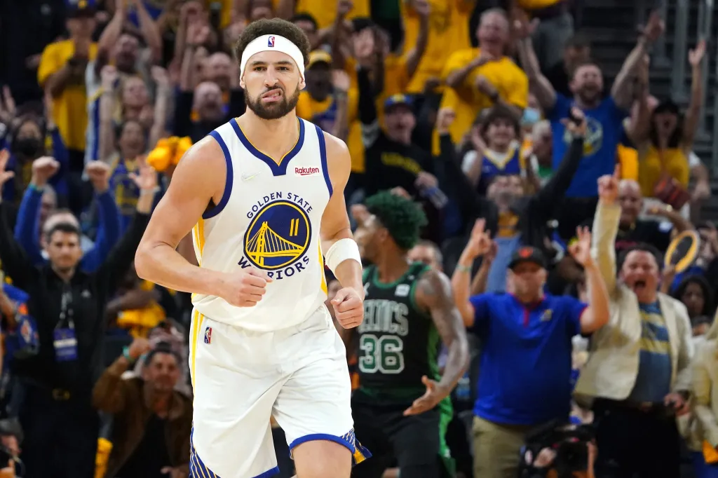 Golden State Warriors guard Klay Thompson reacts after making a three-point basket during the second half in Game 5 of the 2022 NBA Finals against the Boston Celtics at Chase Center in San Francisco, California, on Monday, June 13, 2022. (USA TODAY Sports)