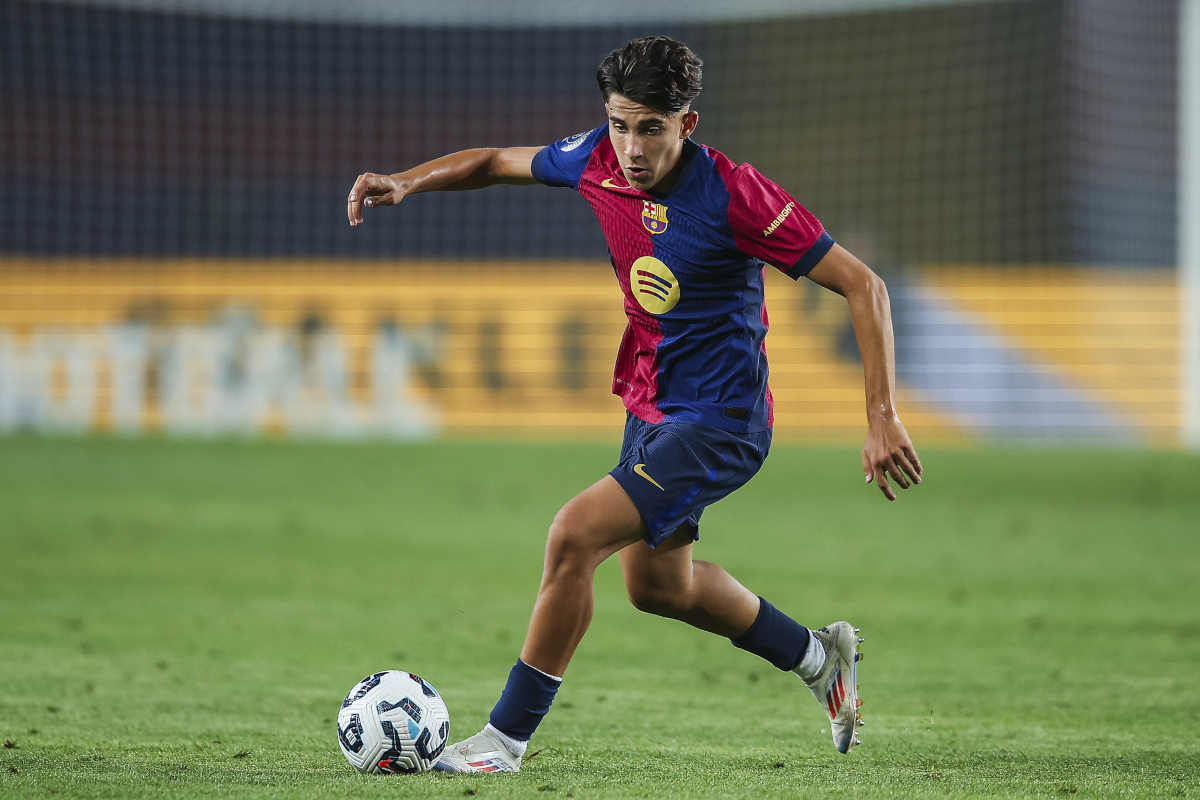 BARCELONA, SPAIN - AUGUST 12: Toni Fernandez of FC Barcelona run with the ball during the Joan Gamper Trophy match between FC Barcelona and AS Monaco at Estadi Olimpic Lluis Companys on August 12, 2024 in Barcelona, Spain. (Photo by Eric Alonso/Getty Images)