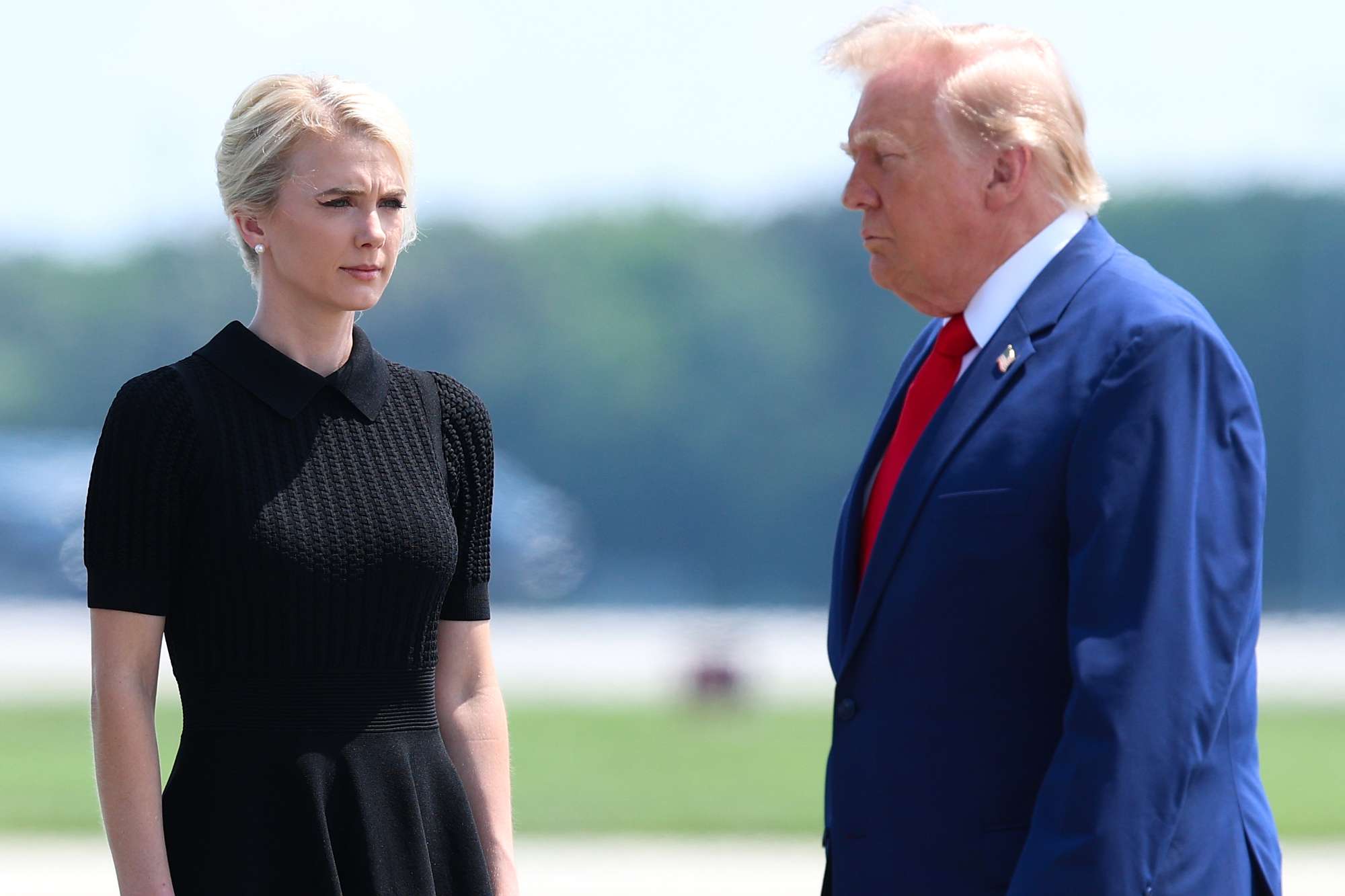Executive assistant to U.S. President Donald Trump Natalie Harp and U.S. President Donald Trump attend a dignified transfer at Dover Air Force Base on July 22, 2026 in Dover, Delaware.