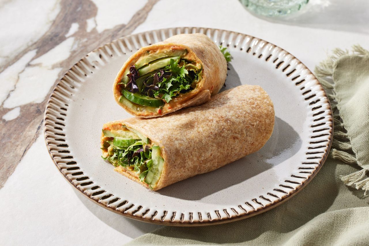 a recipe photo of the Cucumber and Roasted Red Pepper Hummus Credit: Photographer: Brie Goldman, Food Stylist: Skyler Myers, Prop Stylist: Gabriel Greco