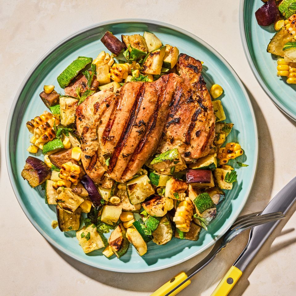 A recipe image of Herb-Marinated Chicken Thighs with Grilled Vegetable Salad Credit: Photographer: Ali Redmond.