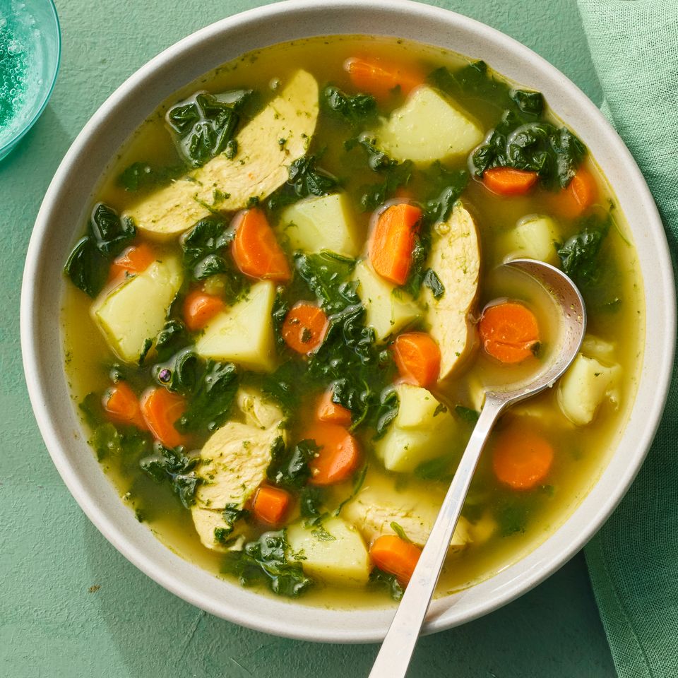 A recipe image of High-Protein Ginger Chicken Soup. Credit: Photographer: Greg Dupree, Prop Stylist: Claire Spollen, Food Stylist: Chelsea Zimmer.