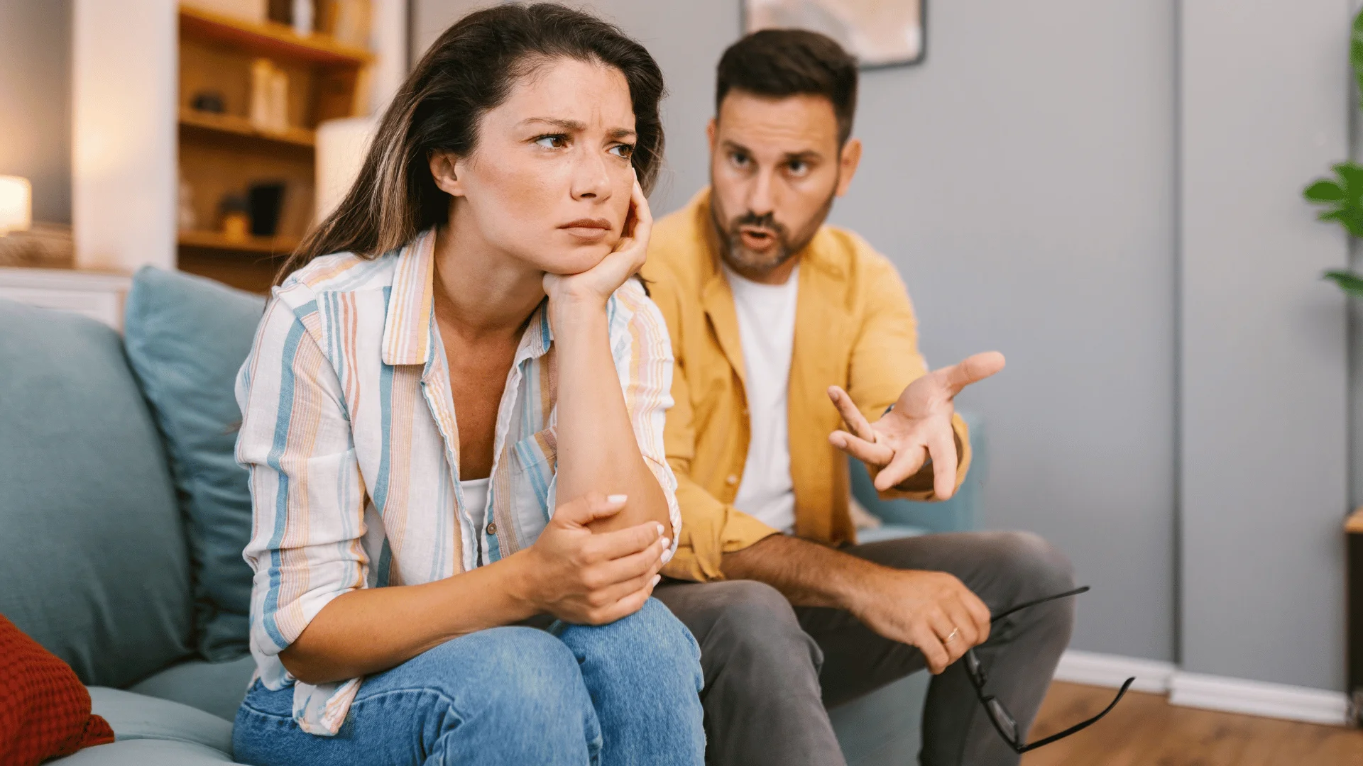 woman upset as she tells man in yellow jacket nothing sounds fun anymore