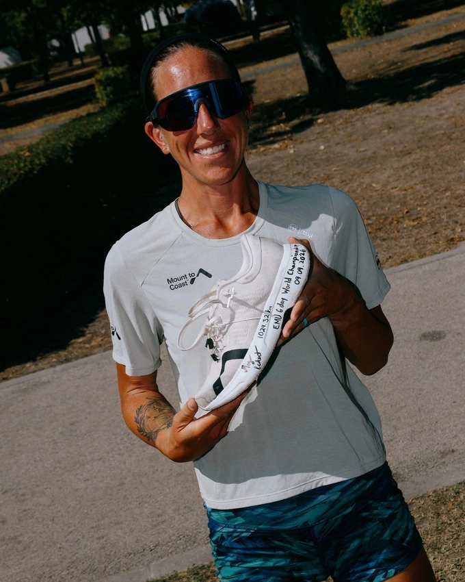 Megan Eckert wrote her world record on her shoes after the run. Photo by Instagram/@_megeckert