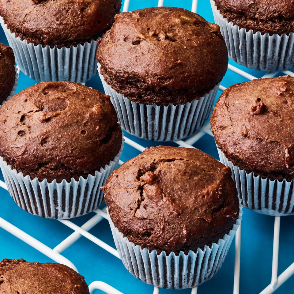 Recipe image of High-Protein Chocolate Muffins. Credit: Photographer Victor Protasio, Food Stylist Margaret Dickey, Prop Stylist Josh Hoggle.