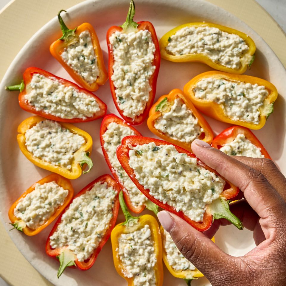 Recipe image of Mini Bell Peppers with Cottage Cheese. Credit: Photographer: Jen Causey, Food Stylist: Emily Nabors Hall, Prop Stylist: Hannah Greenwood.