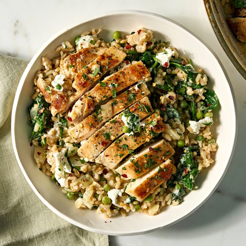 A recipe image of Creamy Lemon Chicken with Spinach & Peas. Credit: Photographer: Jen Causey, Food Stylist: Margaret Monroe Dickey, Prop Stylist: Christina Daley.