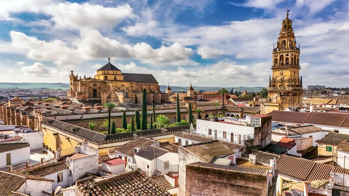 Aerial drone view of cityscape of Cordoba with Mosque-Cathedral, Mezquita Cathedral and skyline of Cordoba, Andalusia, Spain