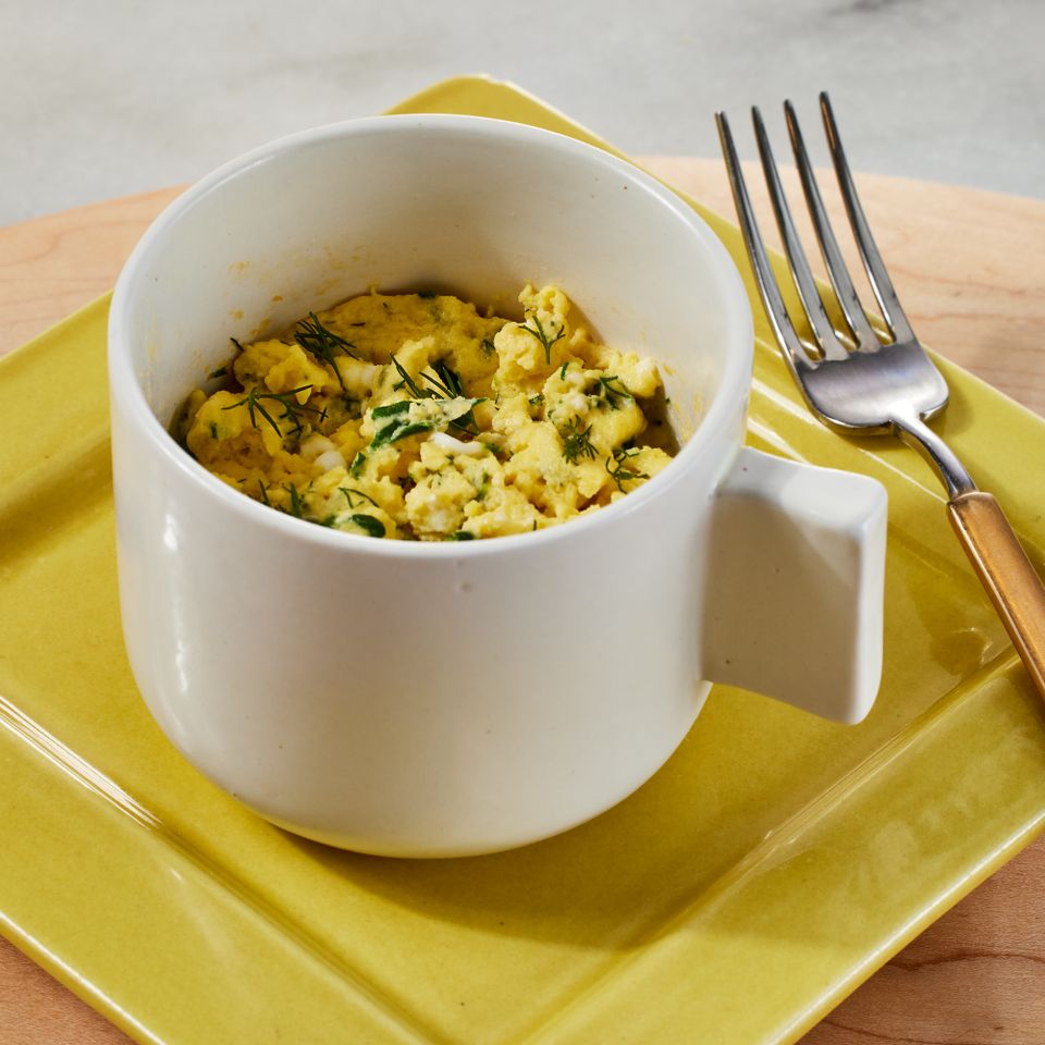 a recipe photo of the Spinach & Feta Mug Scrambled Eggs Credit: Photographer: Jen Causey, Food Stylist: Jennifer Wendorf, Prop Stylist: Priscilla Montiel
