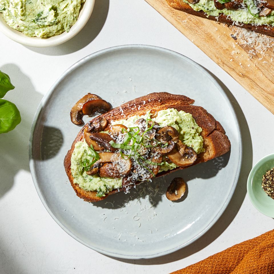 a recipe photo of the Mushroom-Ricotta Tartines Credit: Photographer: Grant Webster, Food Stylist: Addelyn Evans, Prop Stylist: Gabriel Greco,
