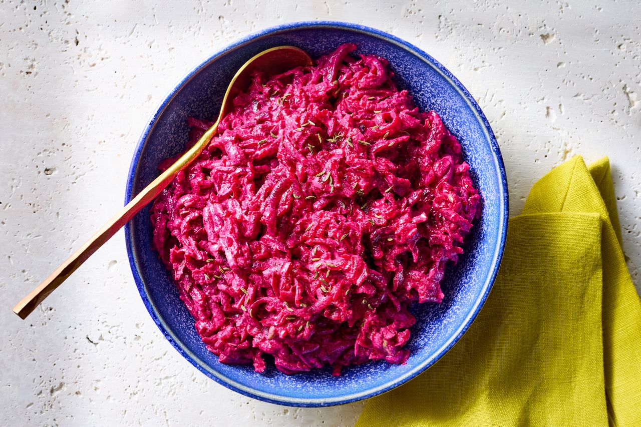 A recipe image of Polish Beet Salad. Credit: Photographer: Jake Sternquist, Food Stylist: Holly Dreesman, Prop Stylist: Gabriel Greco.