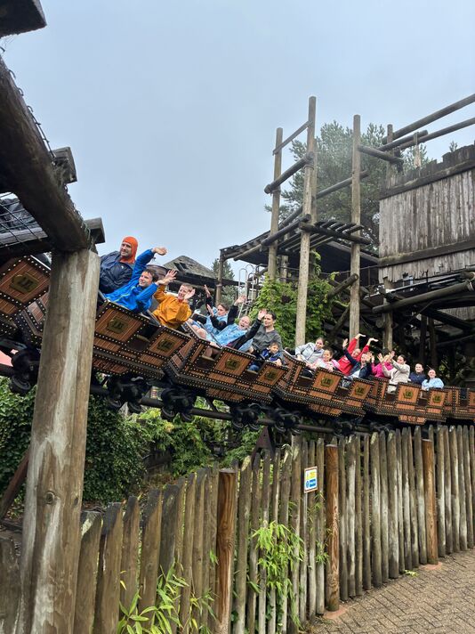 The kids enjoy the Runaway Mine Train ride
