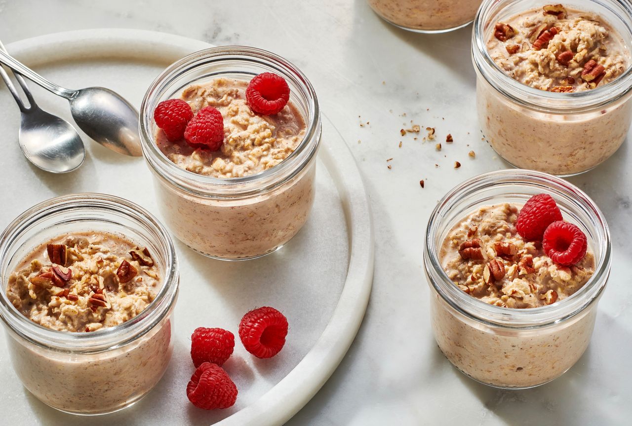 Side view of jars full of Cinnamon-Roll Overnight Oats recipe Credit: Diana Chistruga