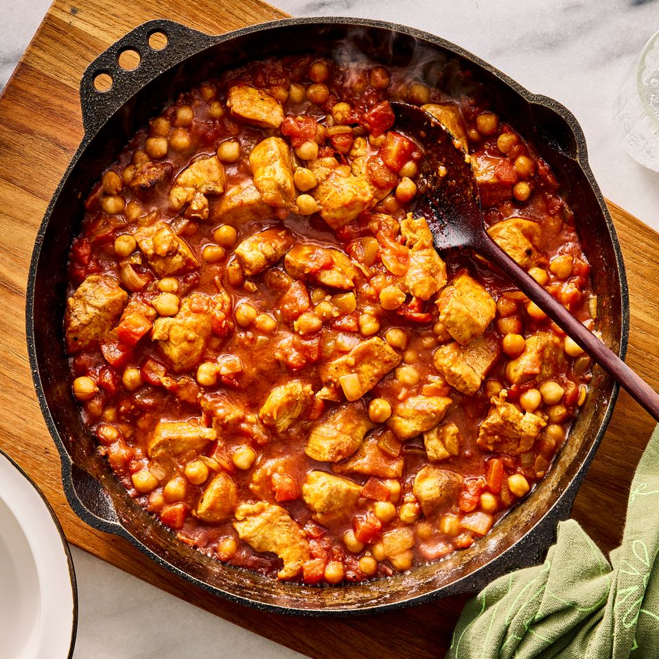 an image of the Cumin Chicken & Chickpea Stew Credit: Photographer: Morgan Hunt Glaze, Prop Stylist: Phoebe Hausser, Food Stylist: Julian Hensarling
