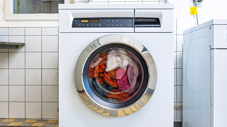A washing machine running its cycle.