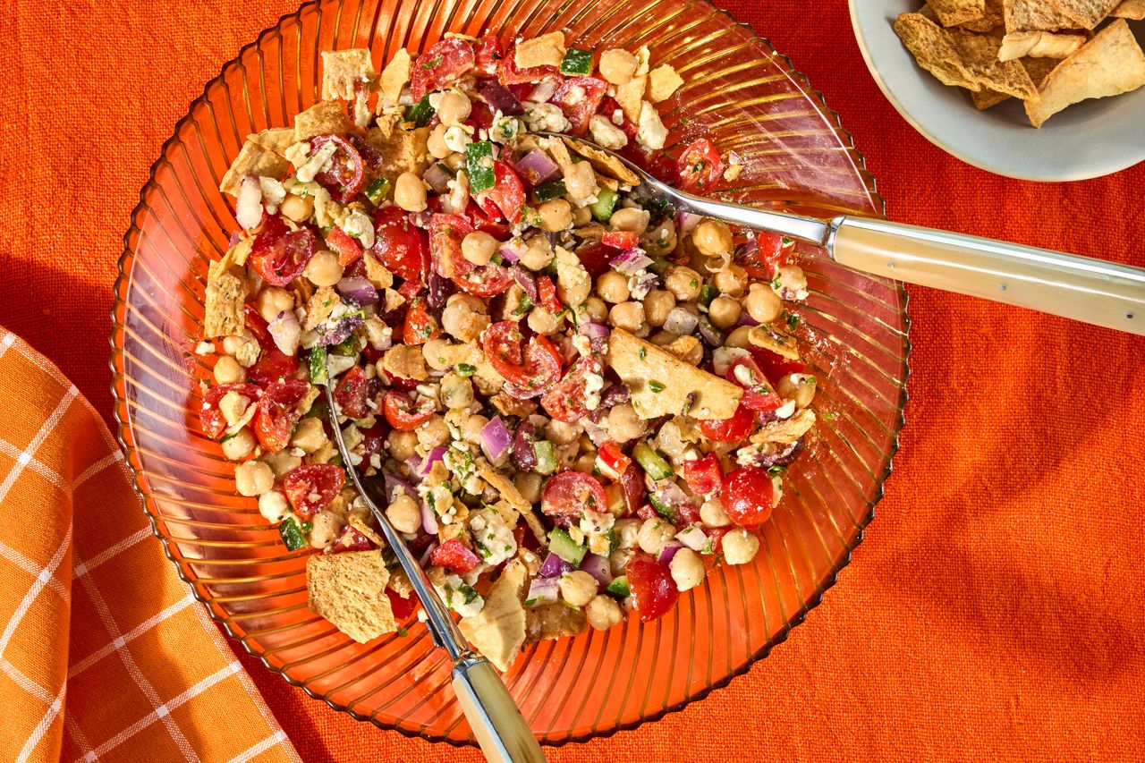 a recipe photo of the Chickpea, Cucumber & Tomato Chopped Salad Credit: Photographer: Jen Causey, Food Stylist: Julian Hensarling, Prop Stylist: Priscilla Montiel