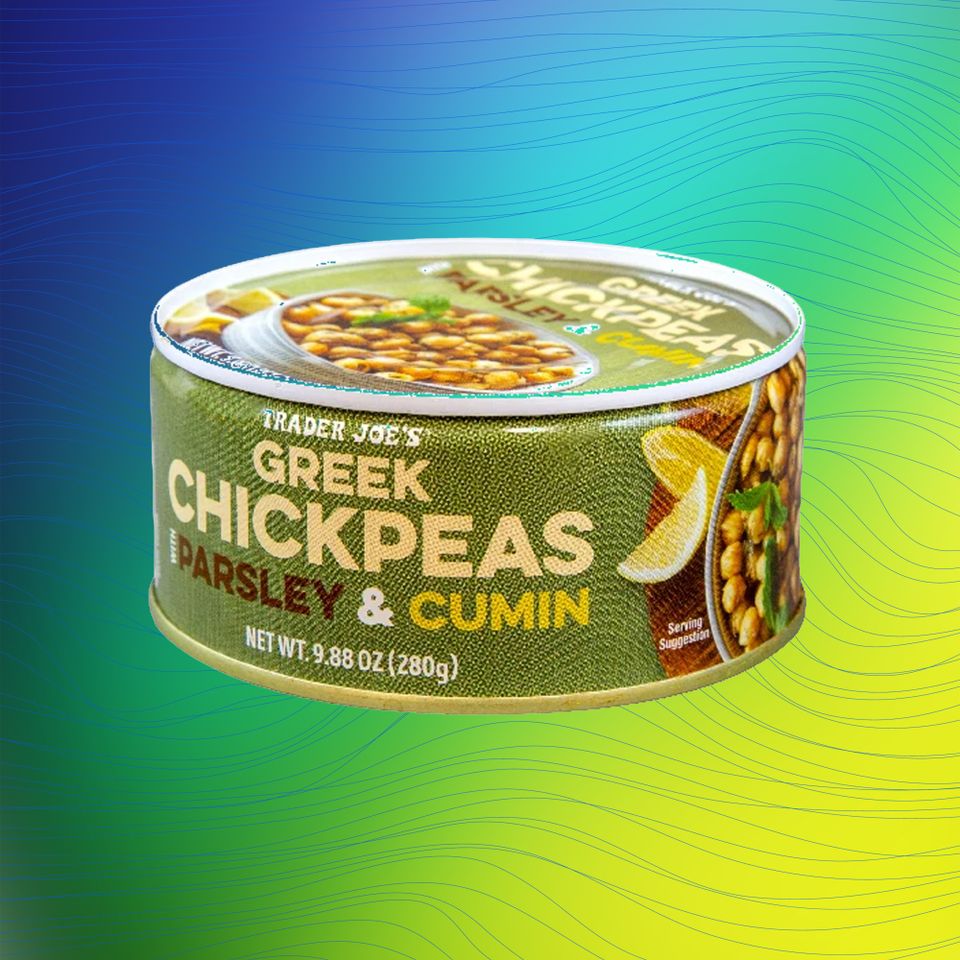 A can of Trader Joes Greek Chickpeas in Parsley and Cumin flavor Credit: Trader Joe's. Getty Images. EatingWell design.