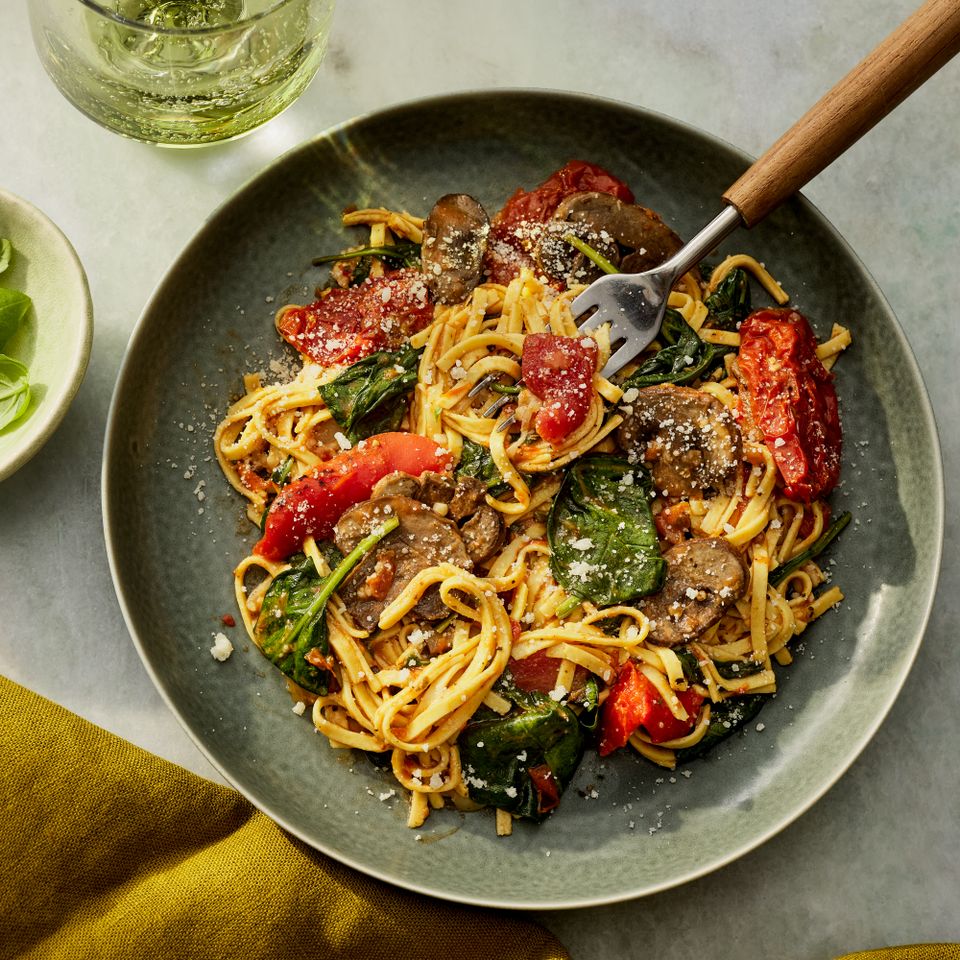 a recipe photo of the Slow-Cooker Sun-Dried Tomato & Spinach Pasta Bake Credit: Photographer: Fred Hardy, Food Stylist: Jennifer Wendorf, Prop Stylist: Lydia Purcell
