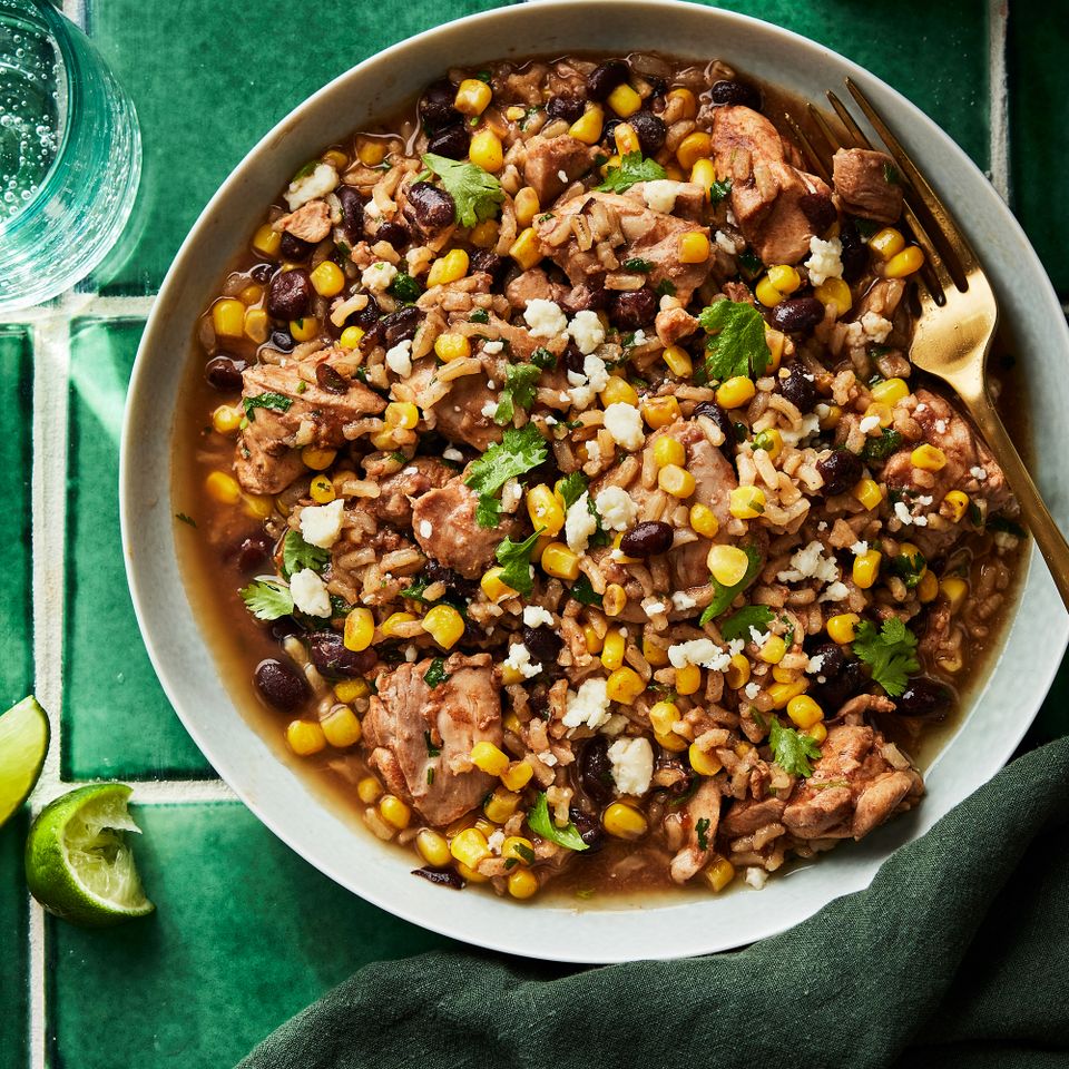 a recipe photo of the Slow-Cooker Chicken & Pinto Bean Enchilada Casserole Credit: Photographer: Greg DuPree, Food Stylist: Ali Ramee Prop Stylist: Christine Keely