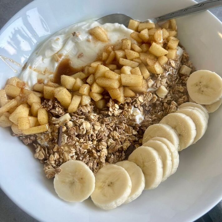 Sliced banana in yoghurt bowl Sliced banana in yoghurt bowl