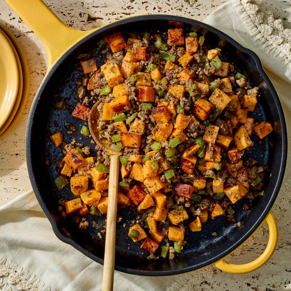 a recipe photo of Ground Beef & Sweet Potato Skillet Credit: Photographer: Jake Sternquist, Food Stylist: Sammy Mila, Prop Stylist: Gabriel Greco