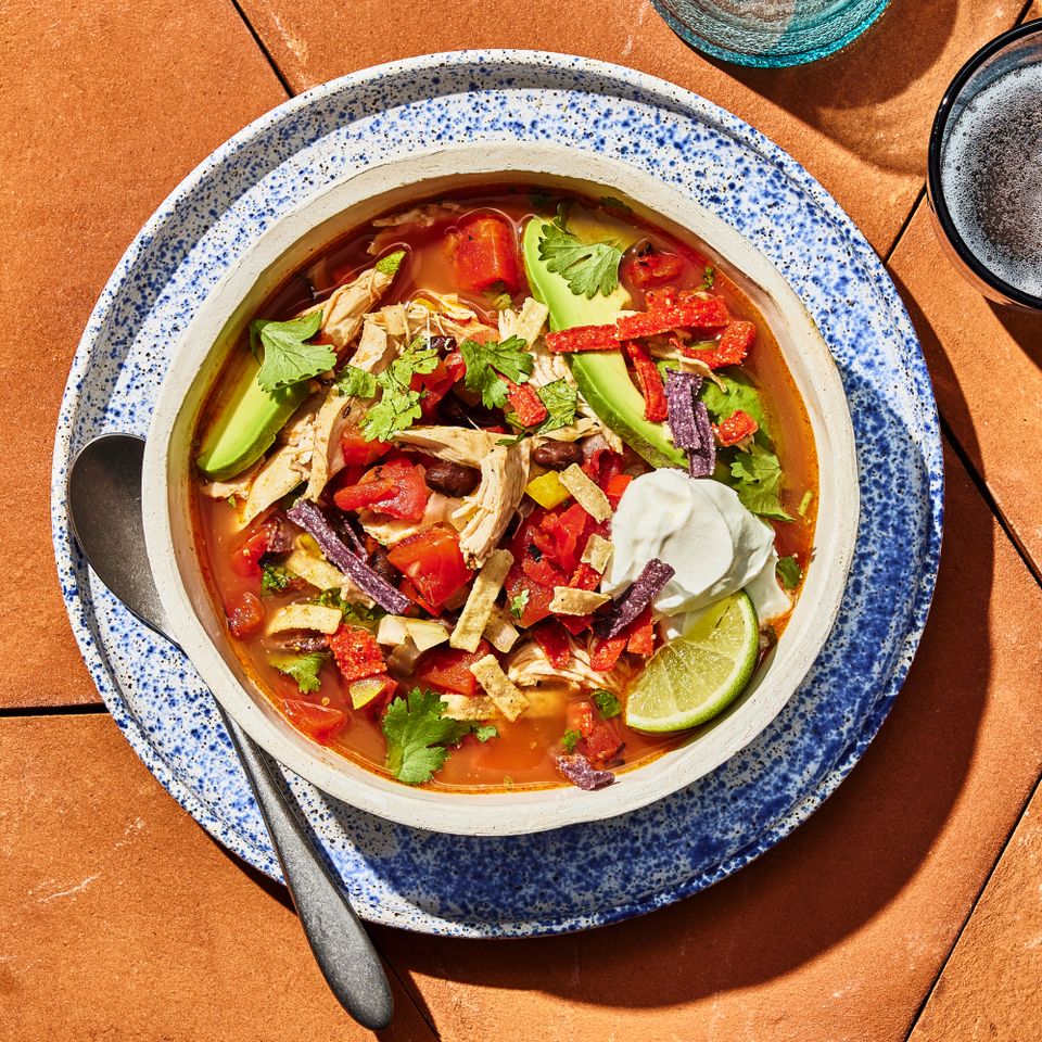 a recipe photo of the Chicken Fajita Soup Credit: Photographer: Morgan Hunt Glaze, Food Stylist: Margaret Monroe Dickey, Prop Stylist: Priscilla Montiel