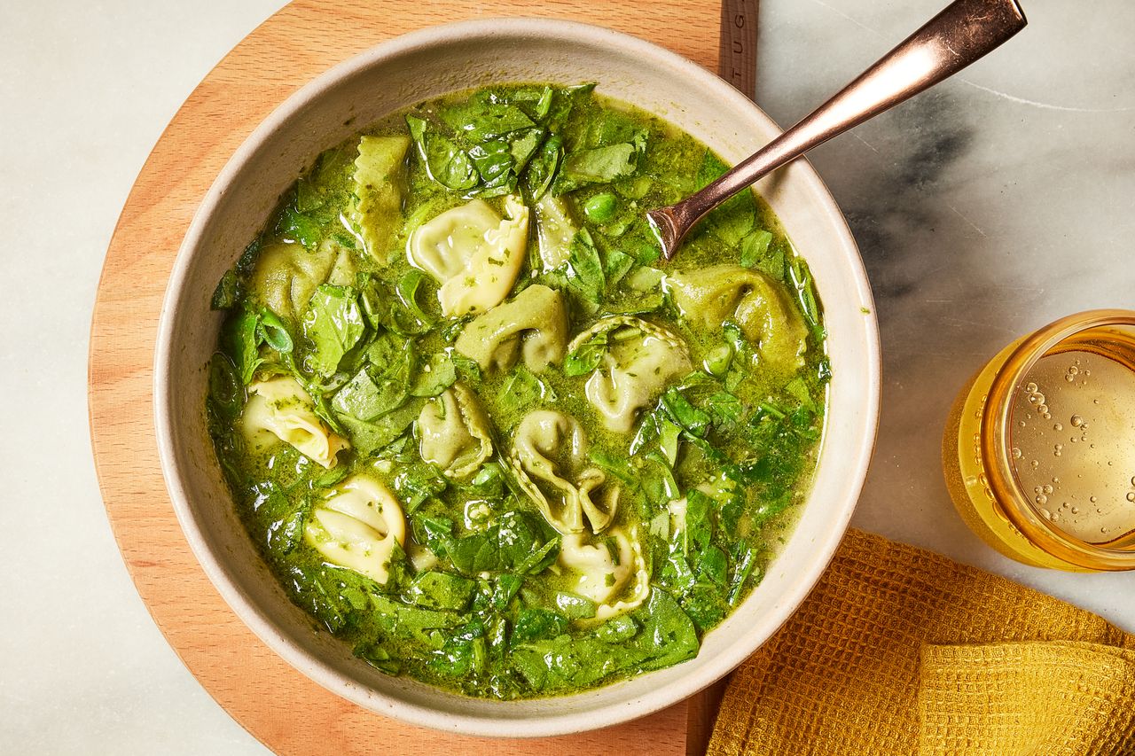 a recipe photo of the Green Tortellini Soup Credit: Photographer: Jen Causey, Food Stylist: Emily Nabors Hall , Prop Stylist: Julia Bayless