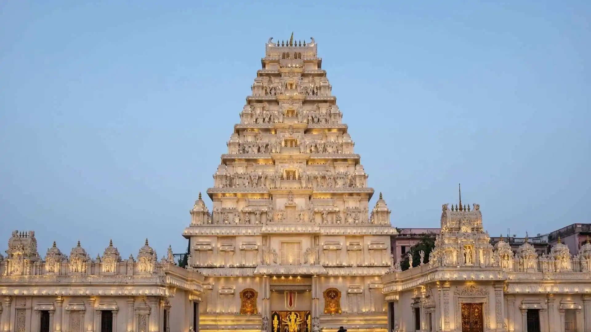 Sree Bhumi Sporting Club in Lake Town is among Kolkata's most talked-about Durga Puja destinations, renowned for its grand installations and larger-than-life pandal designs. The club once drew widespread attention by recreating the opulent world of Mahishmati, inspired by the film Baahubali, transforming the venue into a spectacular setting reminiscent of a cinematic palace. Intricate detailing, elaborate decorations and dramatic lighting are hallmarks of its themed celebrations, attracting devotees, tourists and photography enthusiasts. The pandal combines artistic creativity with the festive spirit of Durga Puja, making it a popular stop for families and first-time visitors to Kolkata during Pujo. Located at Sree Bhumi Sporting Club in Lake Town, it is near the Lake Town Clock Tower, with Jessore Road Metro Station serving as a nearby transit point. Visiting after sunset, between 6:30 pm and 9 pm, offers an opportunity to experience the illuminated decorations and vibrant evening atmosphere.