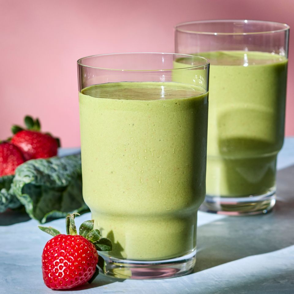A recipe image of Peanut Butter–Strawberry-Kale Smoothie Credit: Photographer: Grant Webster, Food Stylist: Lauren McAnelly, Prop Stylist: Joseph Wanek.