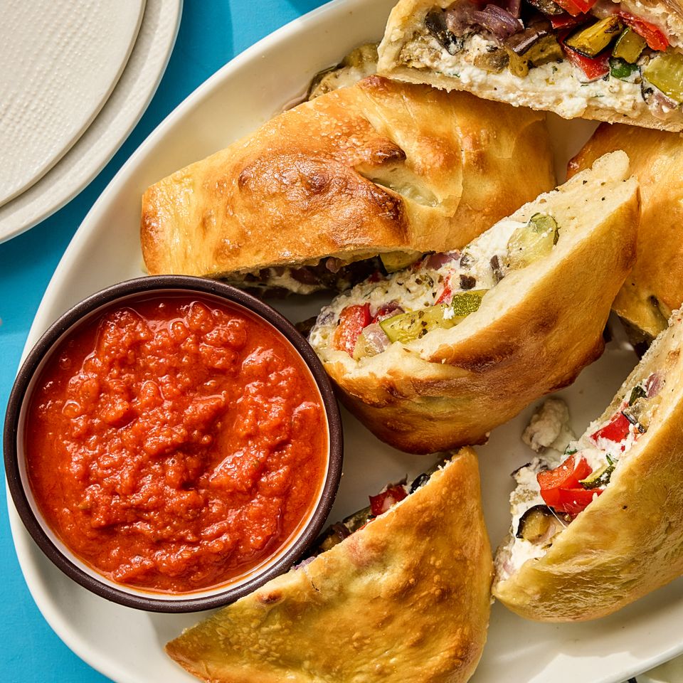 A recipe image of Roasted Veggie & Ricotta Calzone Credit: Photographer: Fred Hardy.
