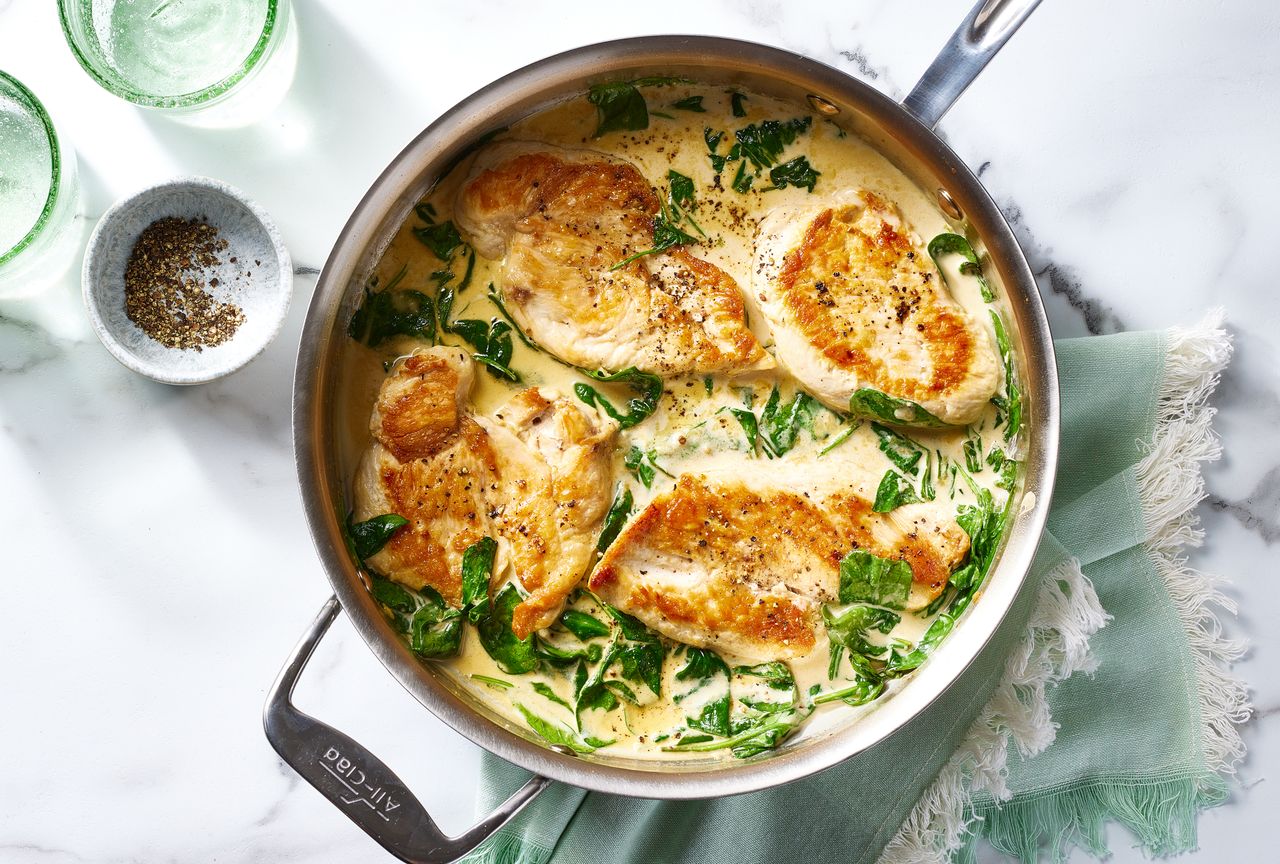 Creamy garlic skillet chicken with spinach recipe Credit: Photographer: Brie Goldman, Food Stylist: Holly Dreesman, Prop Stylist: Gabriel Greco