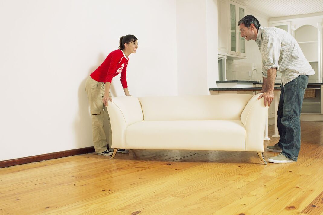 Couple moving couch Couple moving couch