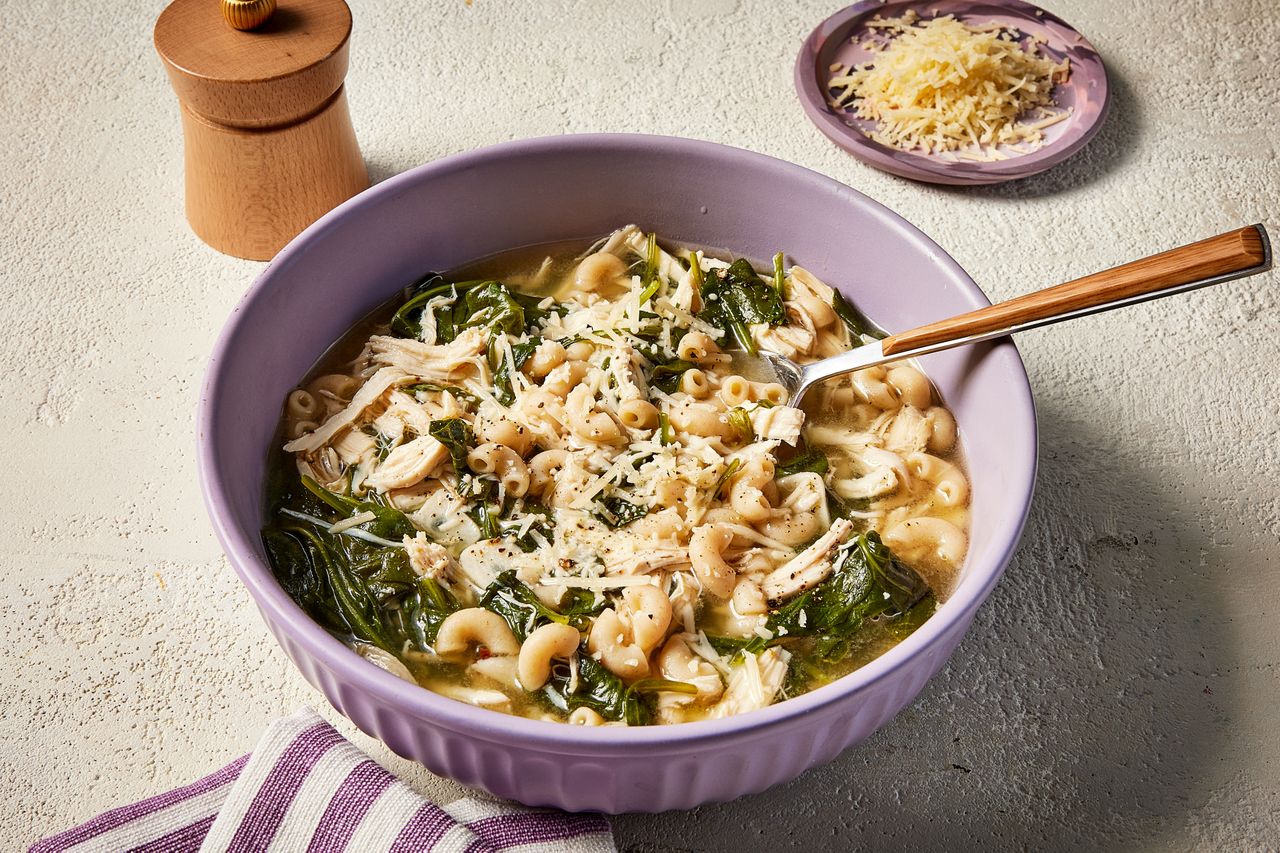 a recipe photo of the Spinach & Chicken Noodle Soup with Lemon & Parmesan Credit: Photographer: Jen Causey, Food Stylist: Emily Nabors Hall , Prop Stylist: Shell Royster