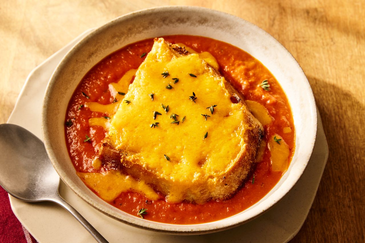 A recipe image of Caramelized-Onion Tomato Soup Credit: Photographer: Morgan Hunt Ward, Prop Stylist: Julia Bayless, Food Stylist: Jennifer Wendorf.